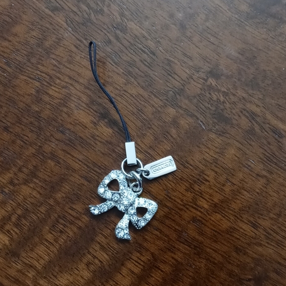 Coach Accessories - Coach silver rhinestone bow cellphone charm Coach Accessories - Coach silver rhinestone bow cellphone charm